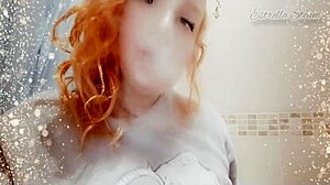 Scene#1 for video: Redheaded beauty smokes a cigarette and shows her ...